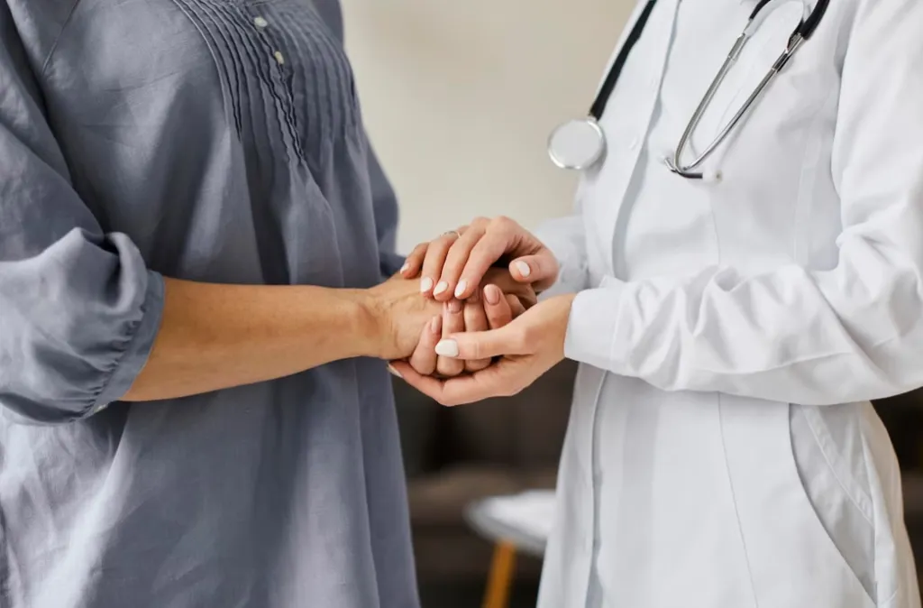 Primary care provider offering compassionate support and personalized care to a patient at a primary care clinic in Jacksonville.