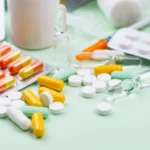 Medications and healthcare supplies representing an Online Health Clinic.