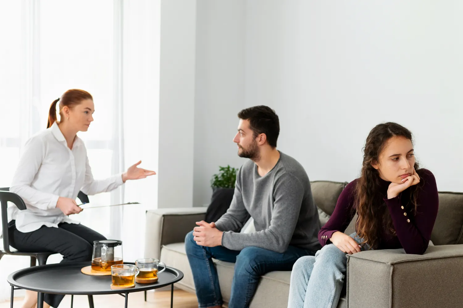 A behavioral therapist guiding a couple through a counseling session, highlighting comprehensive behavioral health services offered at a dedicated behavioral health center in Jacksonville