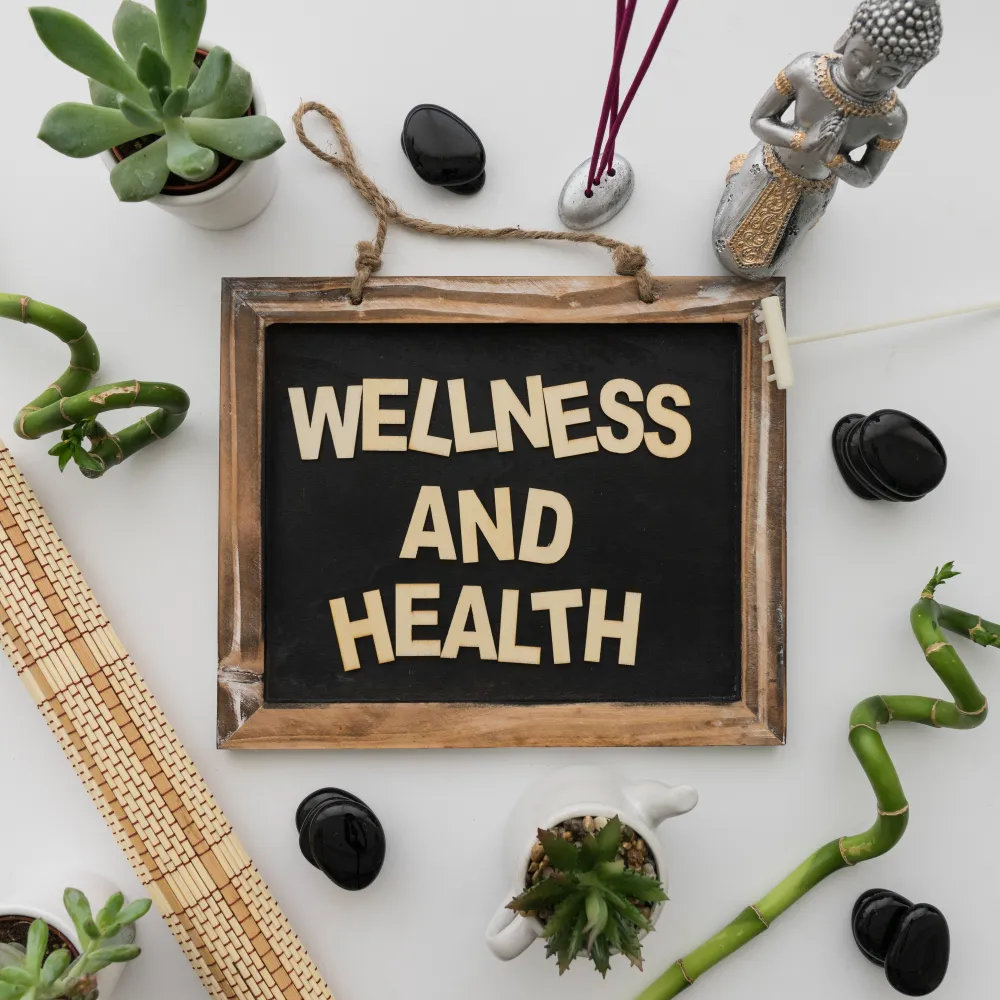 Wellness and health display featuring decorative plants and a wellness message, representing preventive care, routine wellness physicals, and healthy lifestyle services offered by a wellness center in Jacksonville.
