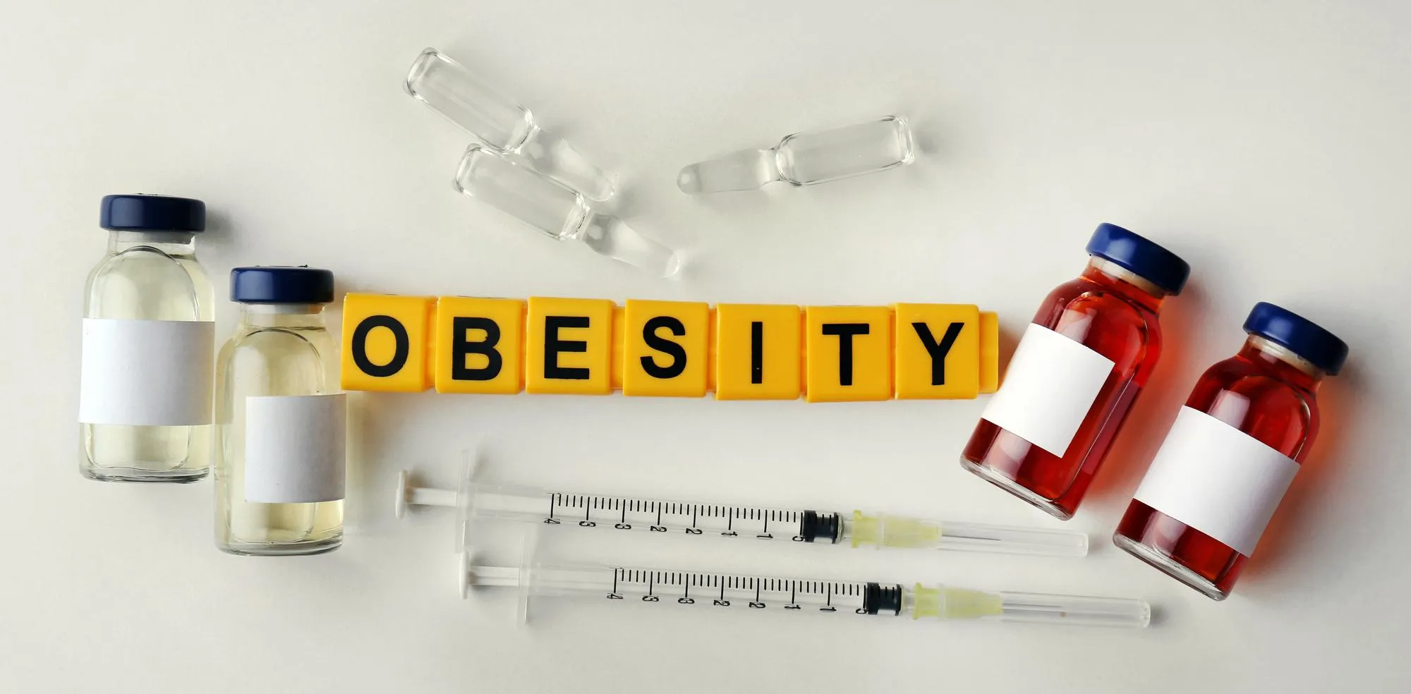 Obesity and weight loss treatment concept with medical injections and weight management therapy solutions