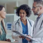 Patient and doctor discussion image representing common questions to ask during a primary care visit at Value Care Clinic.