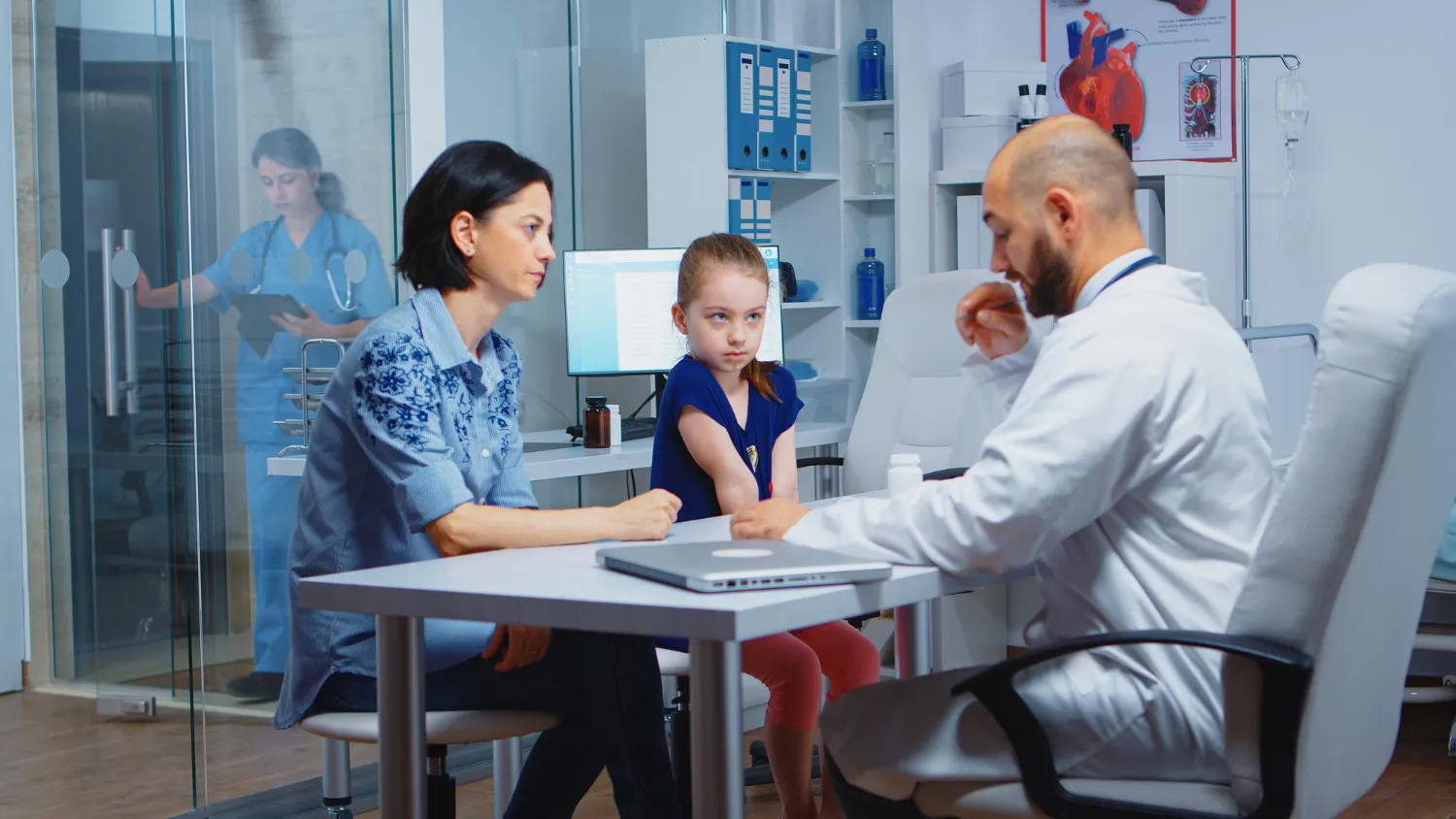 Primary care physician providing personalized care and discussing treatment plans during in-home visit