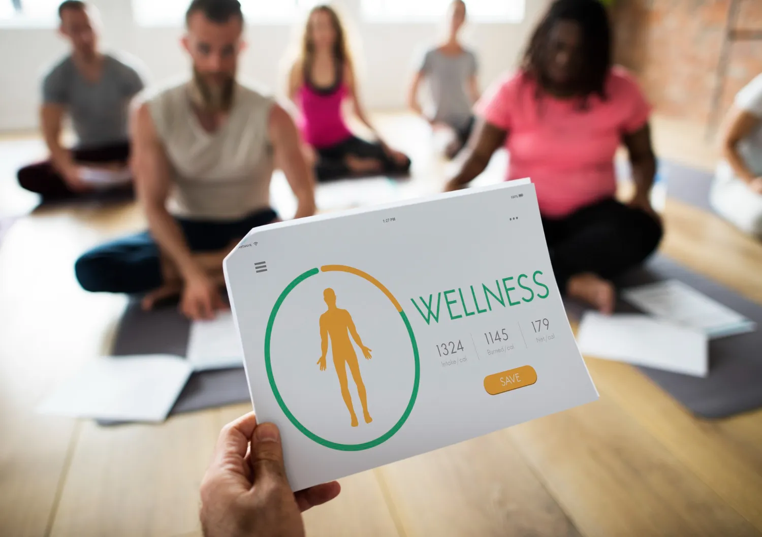 Men’s wellness clinic session featuring group health program with digital wellness tracking for comprehensive men’s health checkup