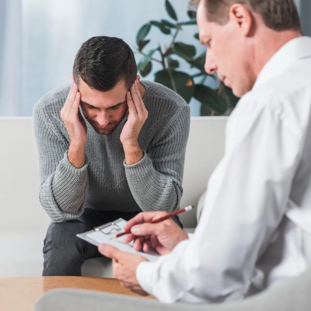 Mental health professional consulting with patient experiencing stress for psychiatry services in Jacksonville and emotional support care
