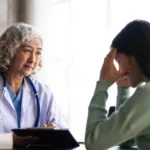 Internist in Jacksonville consulting with a child and parent during a routine medical visit, highlighting comprehensive family healthcare, preventive care, and personalized treatment for all ages.
