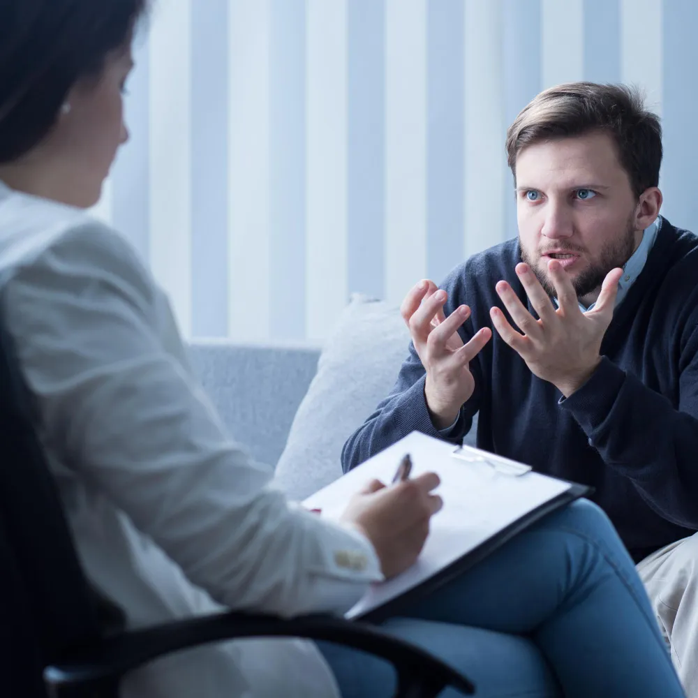 Mental health therapist conducting CBT for depression with a patient, providing Behavioral therapy for depression and personalized depression treatment in Jacksonville.